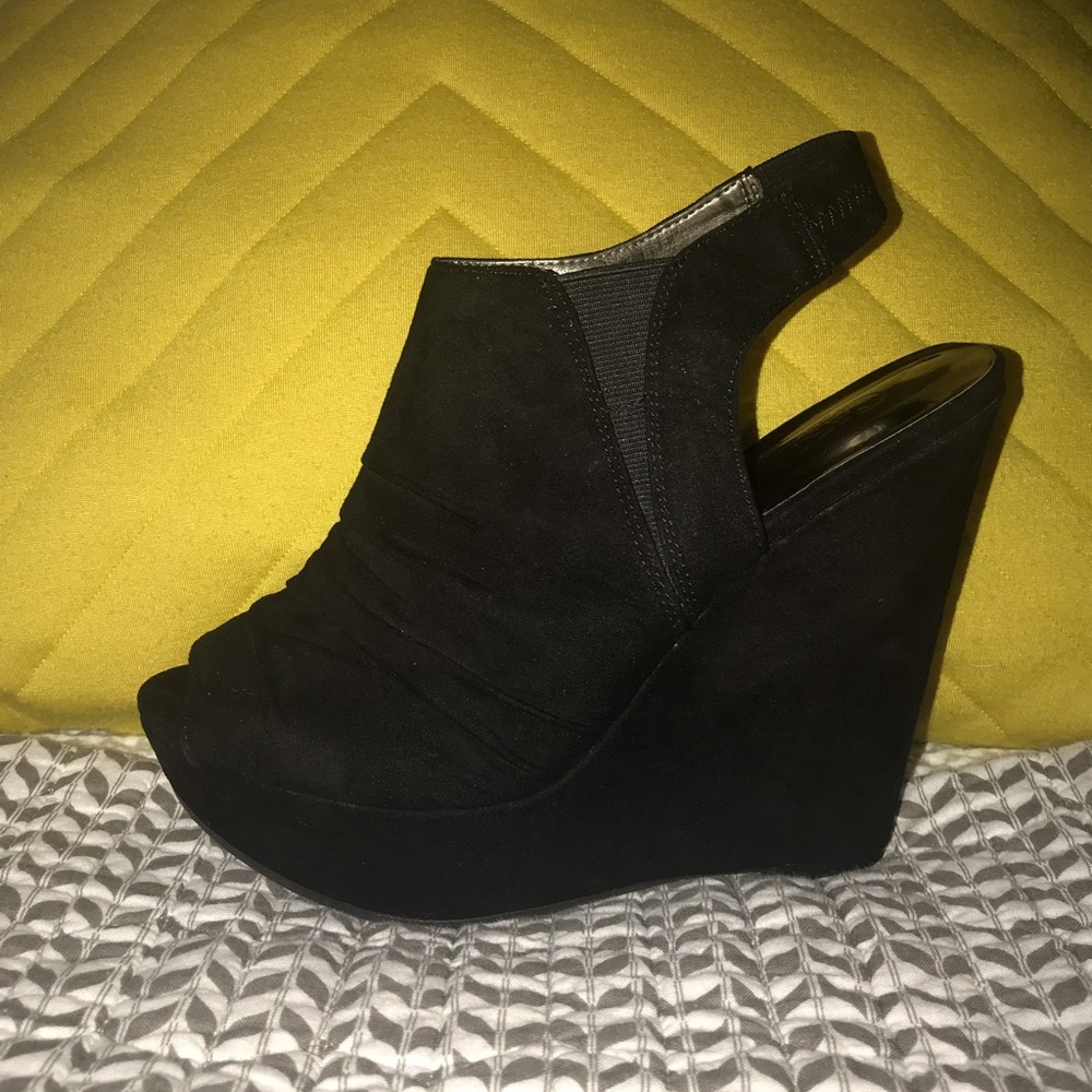 Carlos Santana Wedges